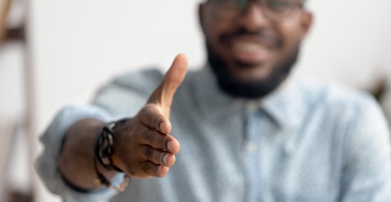 A man offering a handshake