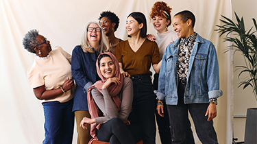 Portrait of cheerful mixed age range multi ethnic women entrepreneurs